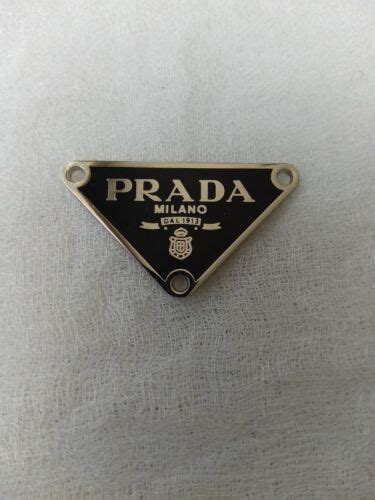 prada women's shoe gold emblem replacement|authenticity of prada shoes.